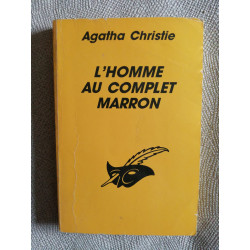L'HOMME AU COMPLET MARRON