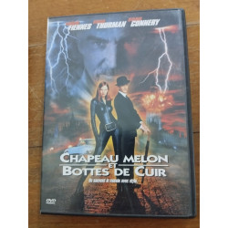 Chapeau melon et bottes de cuir