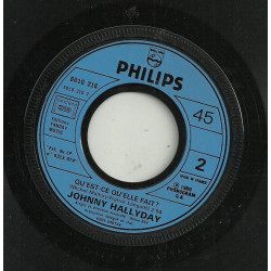 Qu'est-ce Qu'elle Fait