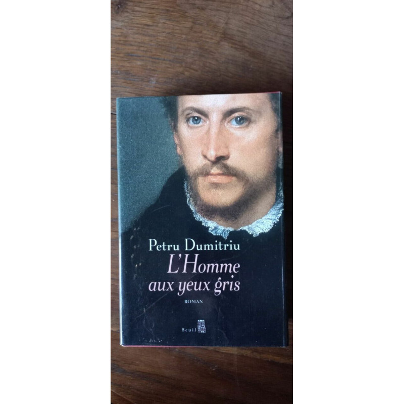 L'Homme aux yeux gris seuil