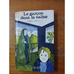 Le garçon dans la valise