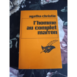 L'homme au complet marron