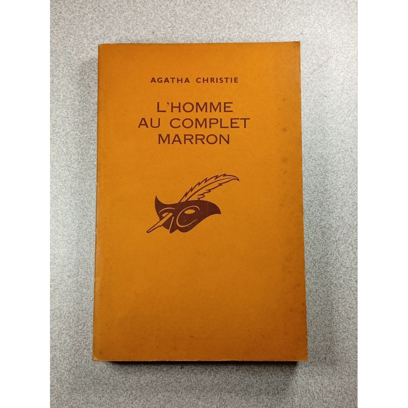 L'homme au complet marron