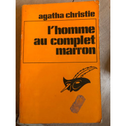 L'homme au complet marron