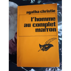 L'homme au complet marron