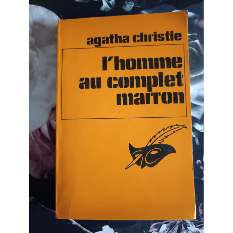 L'homme au complet marron