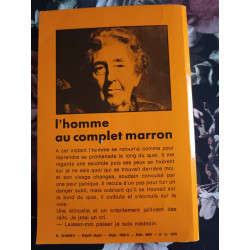 L'homme au complet marron