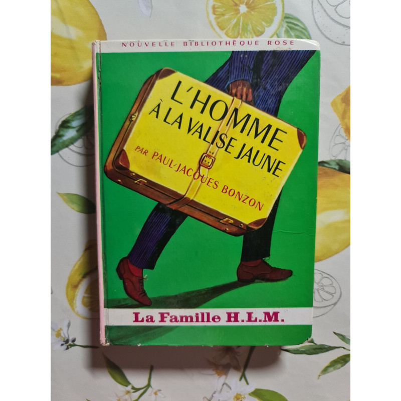L'homme à la valise jaune