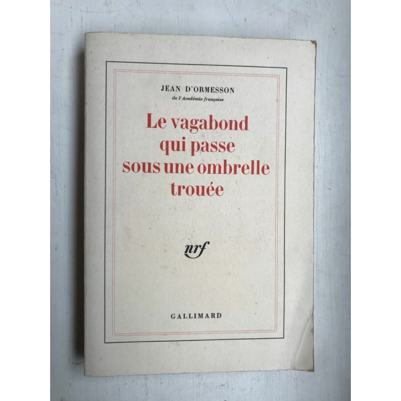Le vagabond qui passe sous une ombrelle trouéegallimard