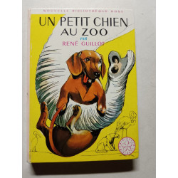 Un petit chien au zoo