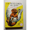 Un petit chien au zoo