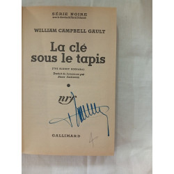 La clé sous le tapis